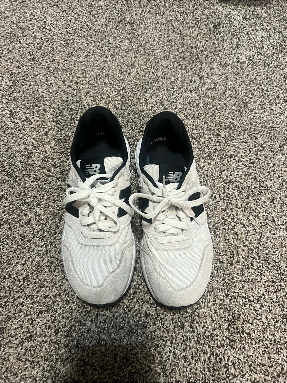 New Balance White Sneakers with Black Interior and Logo